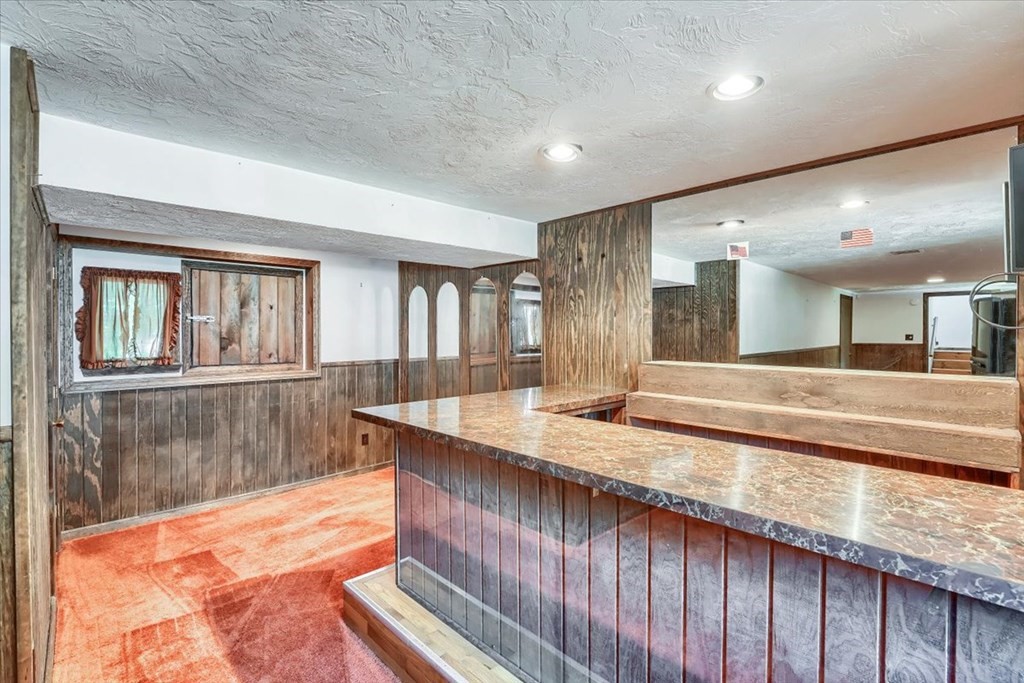 15 Joan Road Boston, MA 02136 - Photo 29 of 37 a view of kitchen island a sink and living room