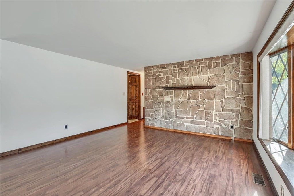15 Joan Road Boston, MA 02136 - Photo 7 of 37 wooden floor in an empty room with a window