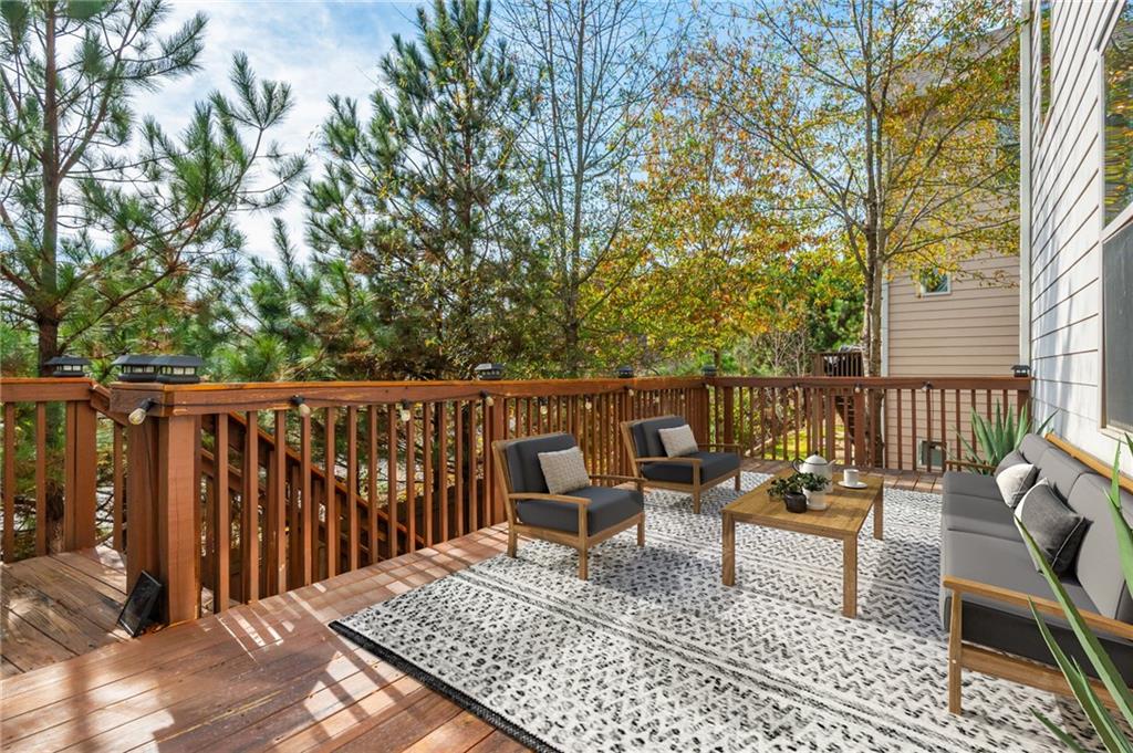 5914 High Hampton Lane Mableton, GA 30126 - Photo 8 of 32 a balcony with wooden floor and furniture