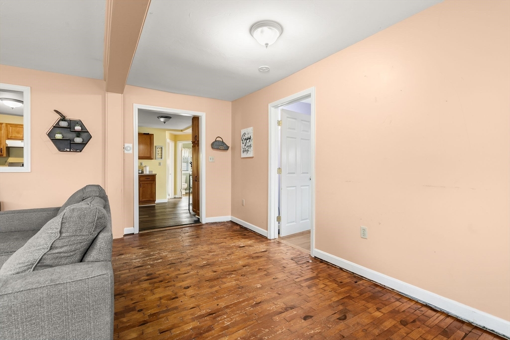 90 Loring Avenue Whitman, MA 02382 - Photo 6 of 22 a view of livingroom with furniture and wooden floor