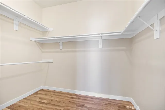 a view of an empty walk in closet