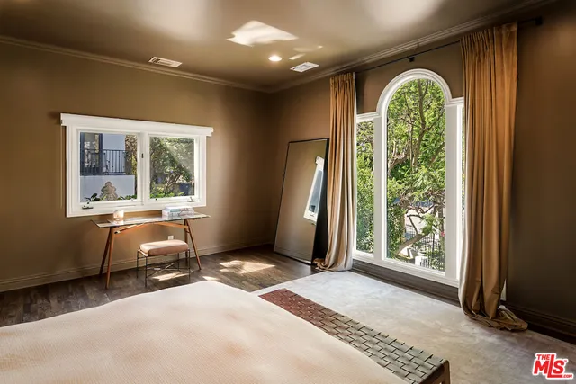 wooden floor and window in a room