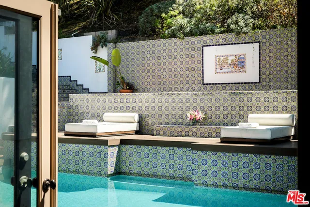 a view of bathroom with a bath tub and sink