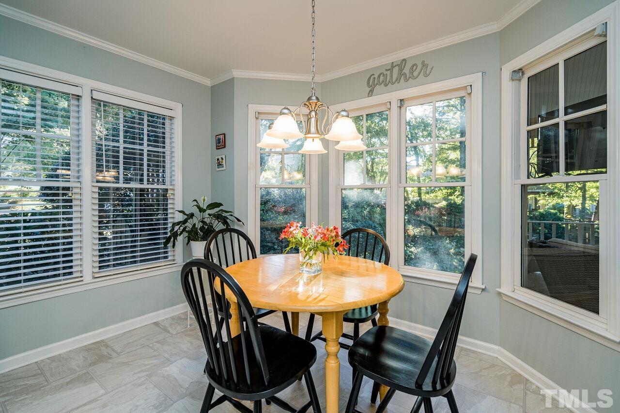 2201 Dunlin Lane Raleigh, NC 27614 - Photo 14 of 30 a view of a dining room with furniture window and outside view