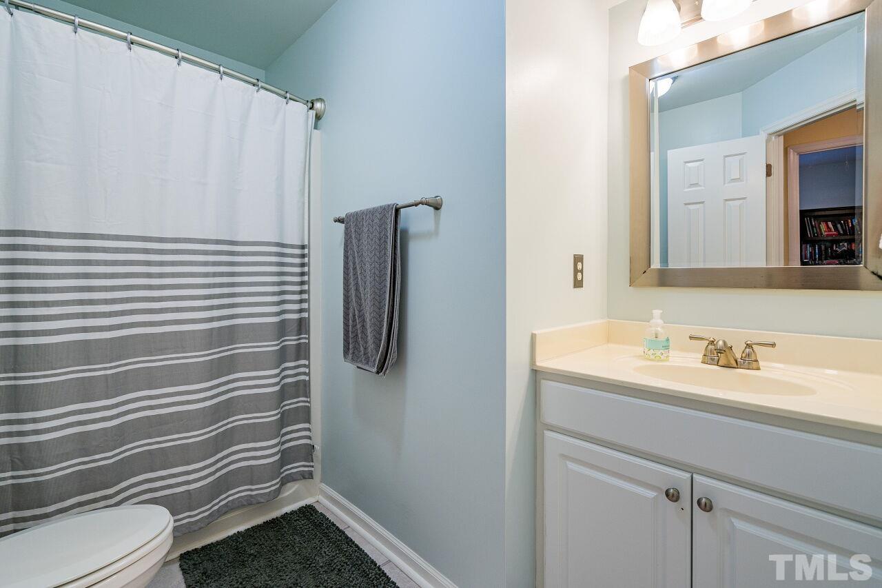 2201 Dunlin Lane Raleigh, NC 27614 - Photo 21 of 30 a bathroom with a sink toilet and shower