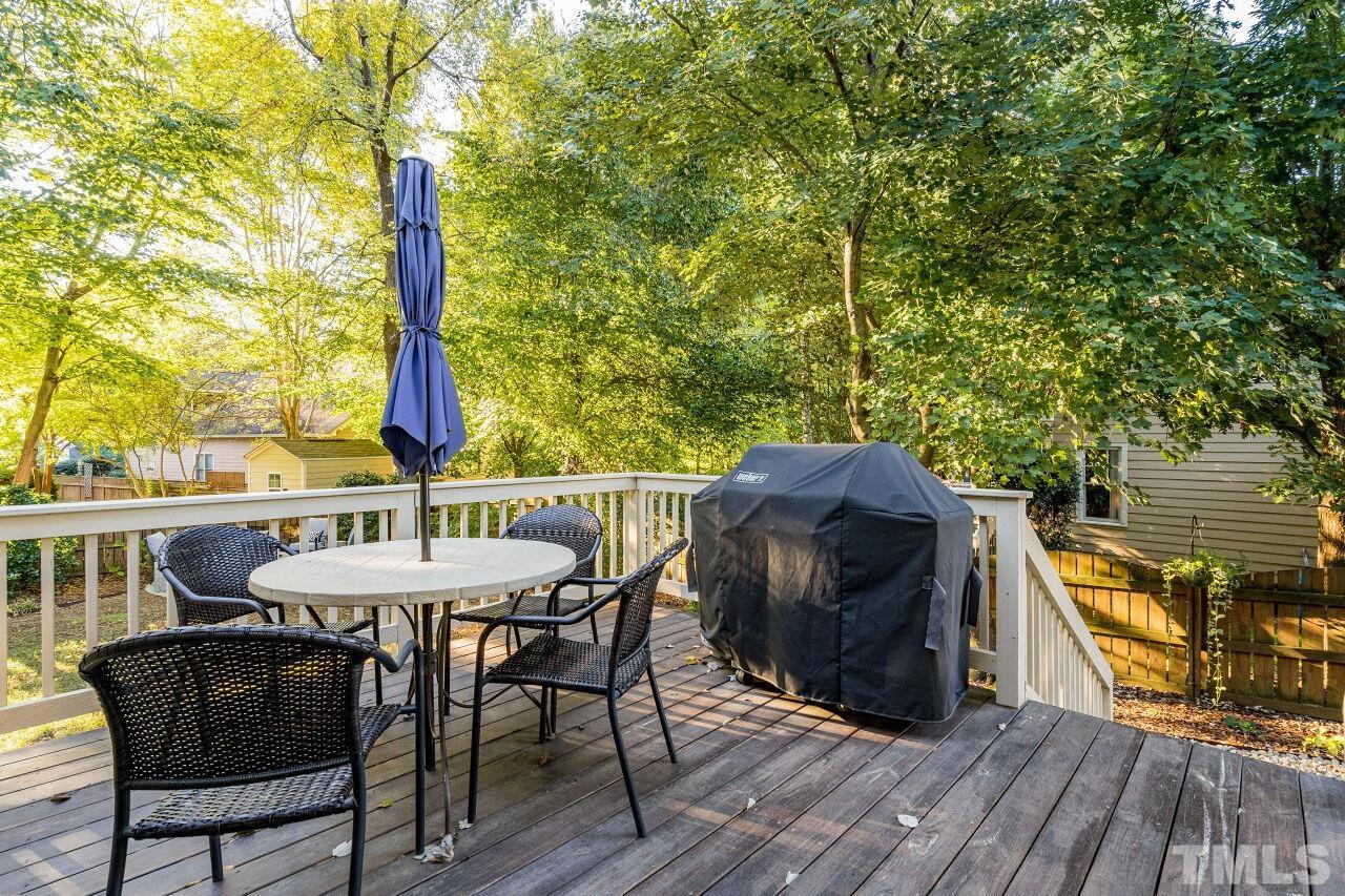 2201 Dunlin Lane Raleigh, NC 27614 - Photo 27 of 30 a view of a balcony with furniture and wooden floor
