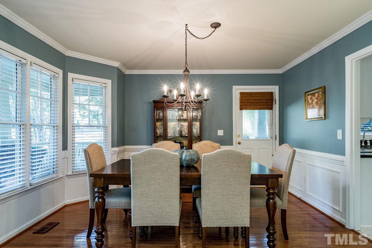 2201 Dunlin Lane Raleigh, NC 27614 - Photo 9 of 30 a view of a dining room with furniture window and wooden floor