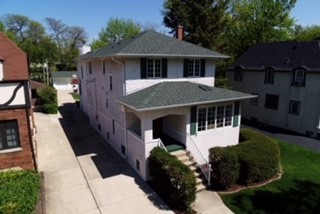 281 Northwood Road Riverside, IL 60546 - Photo 1 of 1 a front view of a house with a garden