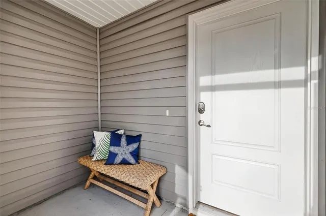 a view of sitting area in front of house
