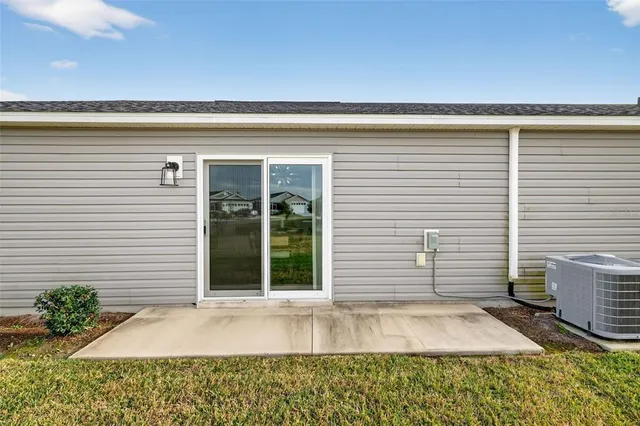 a view of a back yard of the house