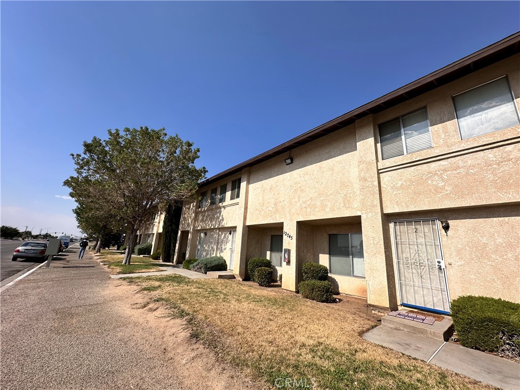 12745 Navajo Road Apple Valley, CA 92308 - Photo 2 of 24 Sidewalk View