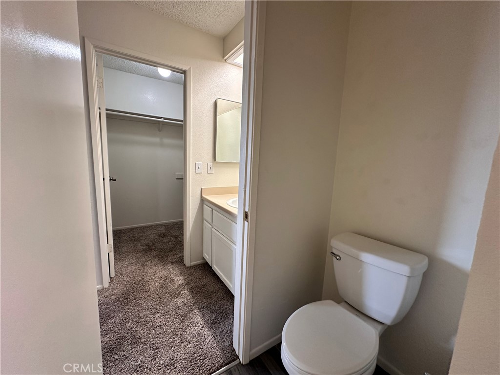 12745 Navajo Road Apple Valley, CA 92308 - Photo 23 of 24 Unit 6: Primary Room Sink and Upstairs Bathroom