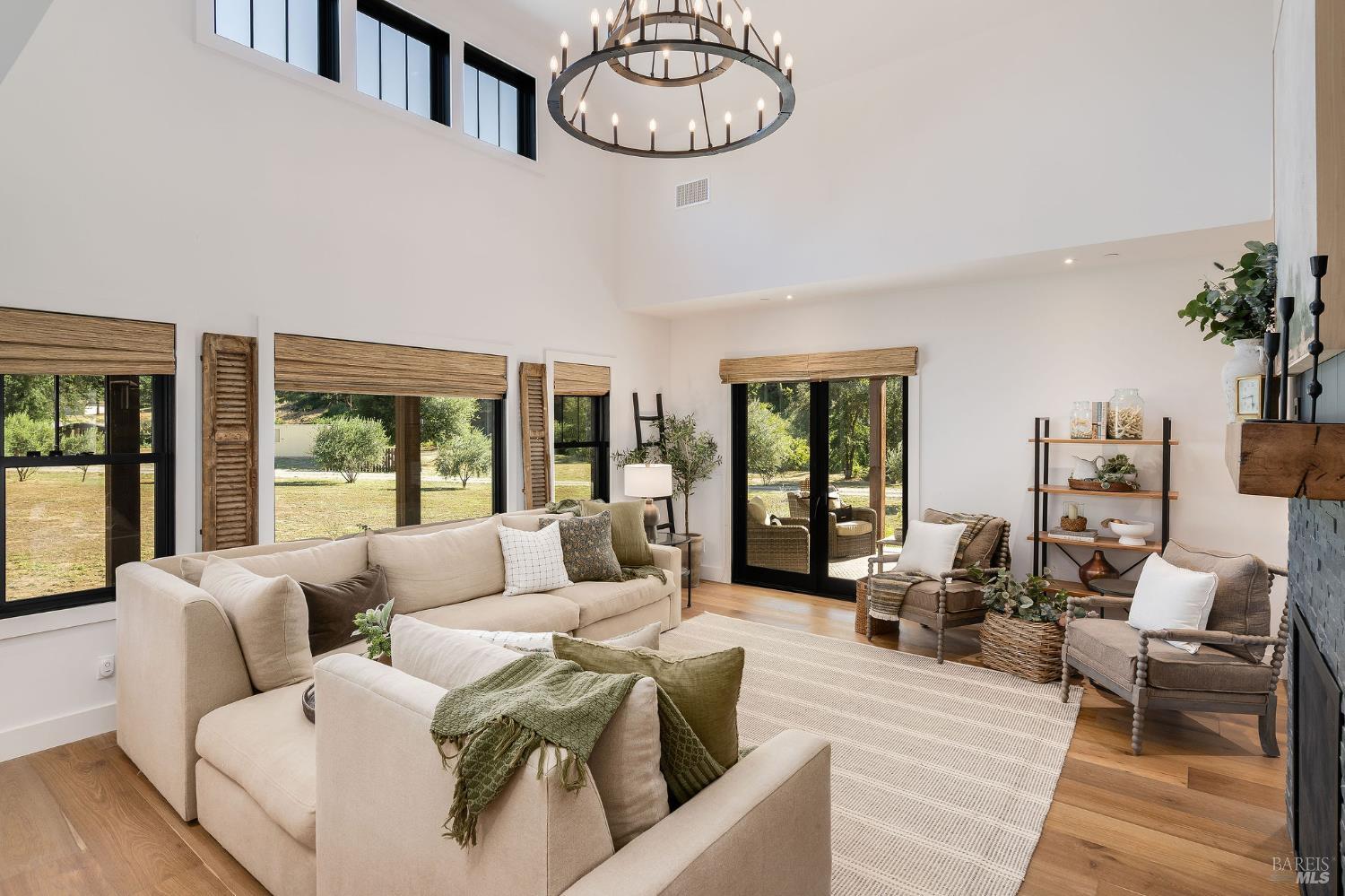 5400 Wragg Canyon Road Napa, CA 94558 - Photo 15 of 68 a living room with furniture large window and outdoor view