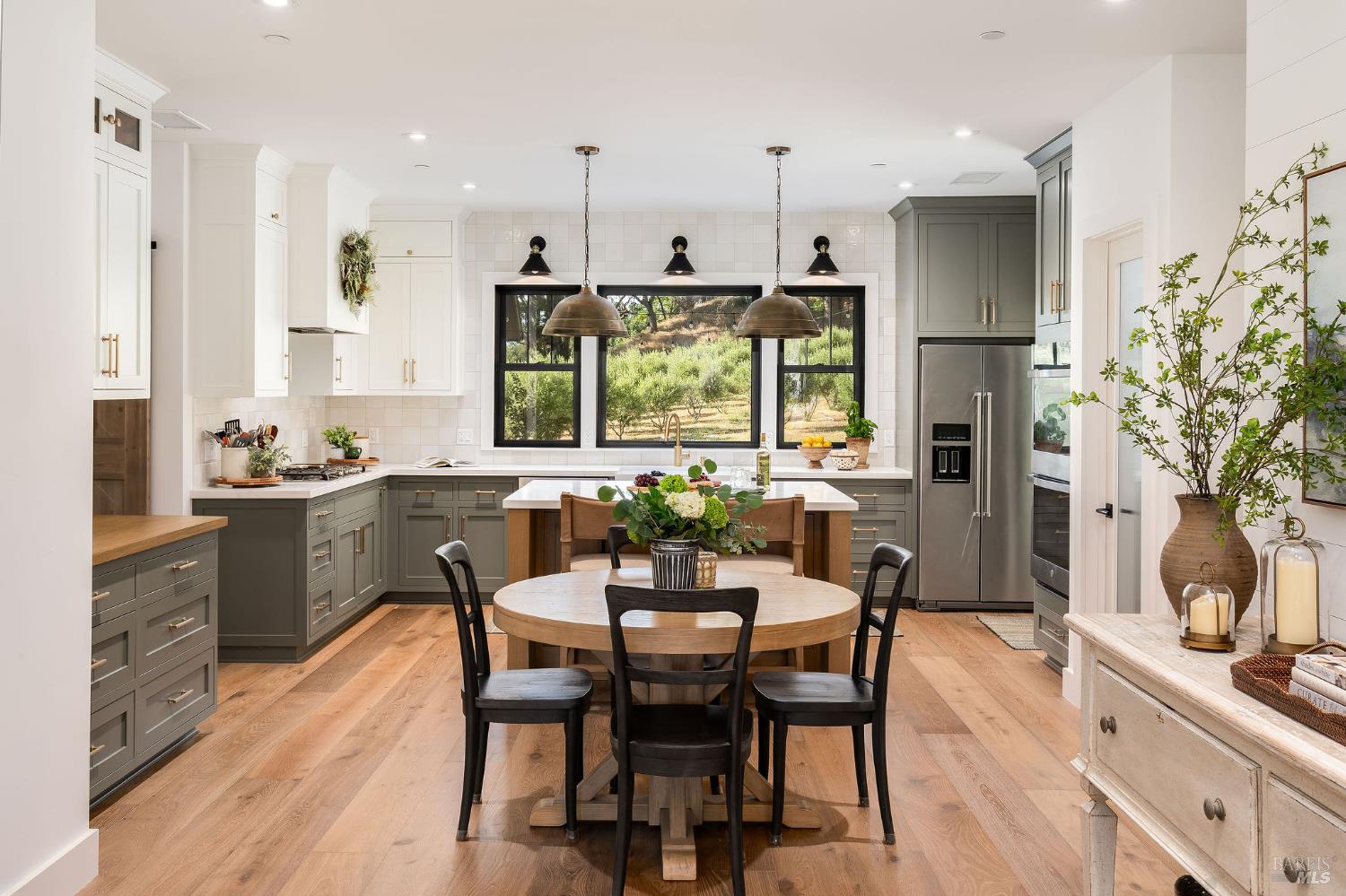 5400 Wragg Canyon Road Napa, CA 94558 - Photo 22 of 68 a view of a dining room with furniture window and wooden floor