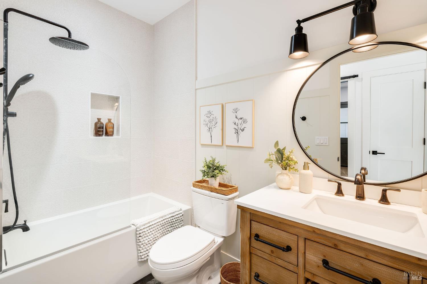 5400 Wragg Canyon Road Napa, CA 94558 - Photo 43 of 68 a bathroom with a toilet a sink and a mirror