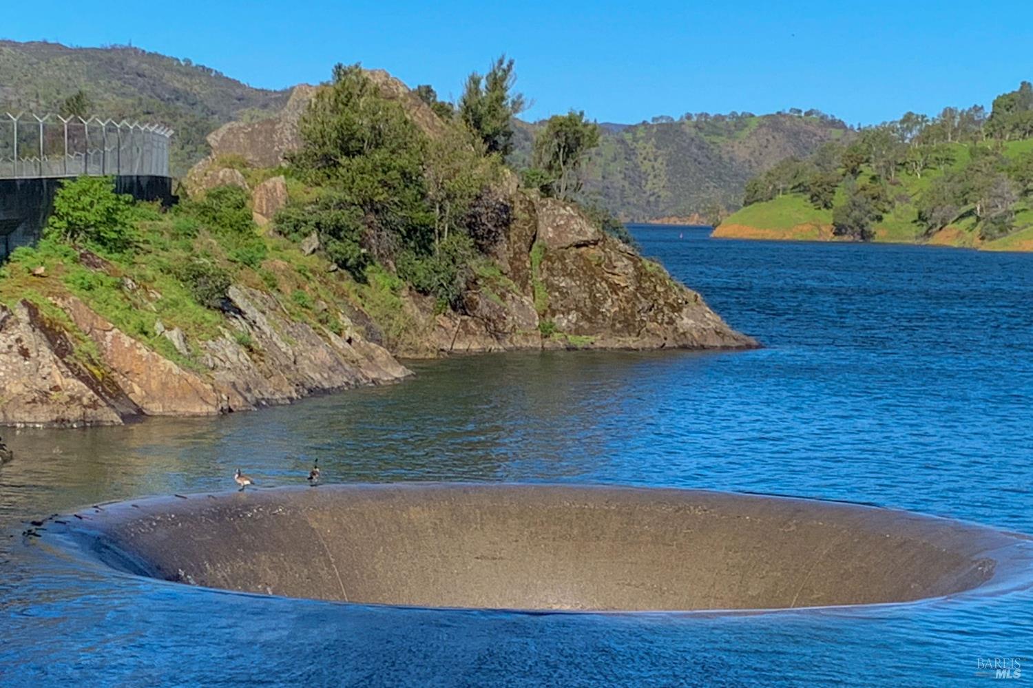 5400 Wragg Canyon Road Napa, CA 94558 - Photo 60 of 68 a view of a lake with a mountain in the background