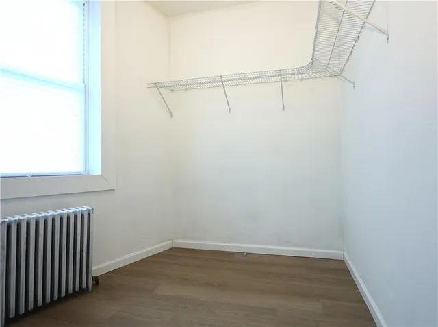 a view of small space with racks on the wall