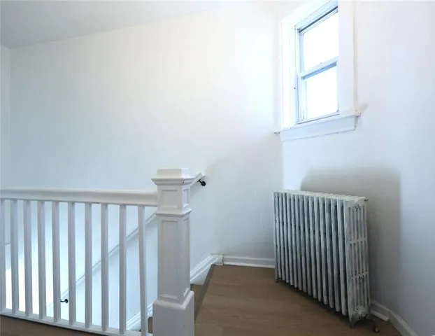 a view of a room with a window