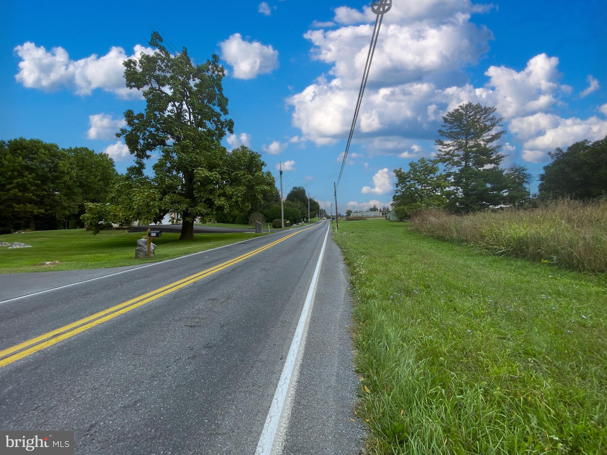 1040 Cider Press Road Chambersburg, PA 17202 - Photo 6 of 10 a view of a building with a big yard