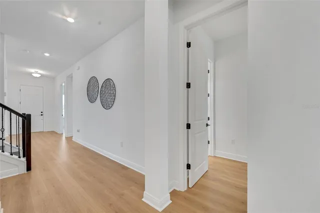 a view of a hallway with entryway