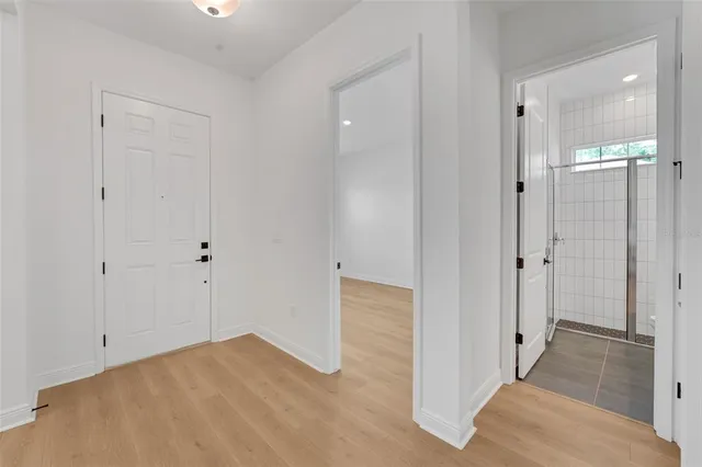 a view of a bathroom with a sink and shower