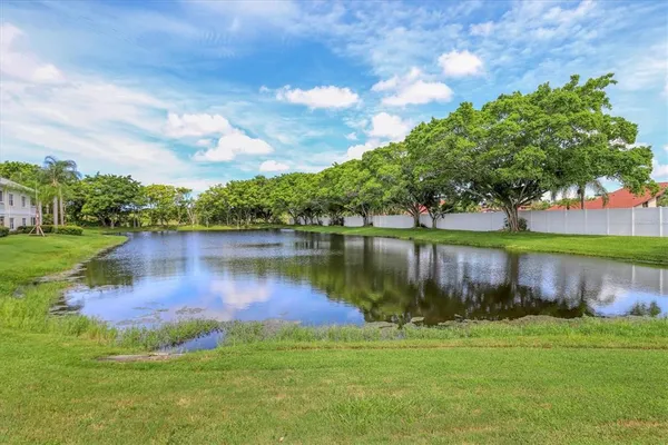 a view of a lake with a big yard