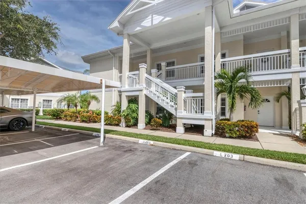 a front view of a building with garden