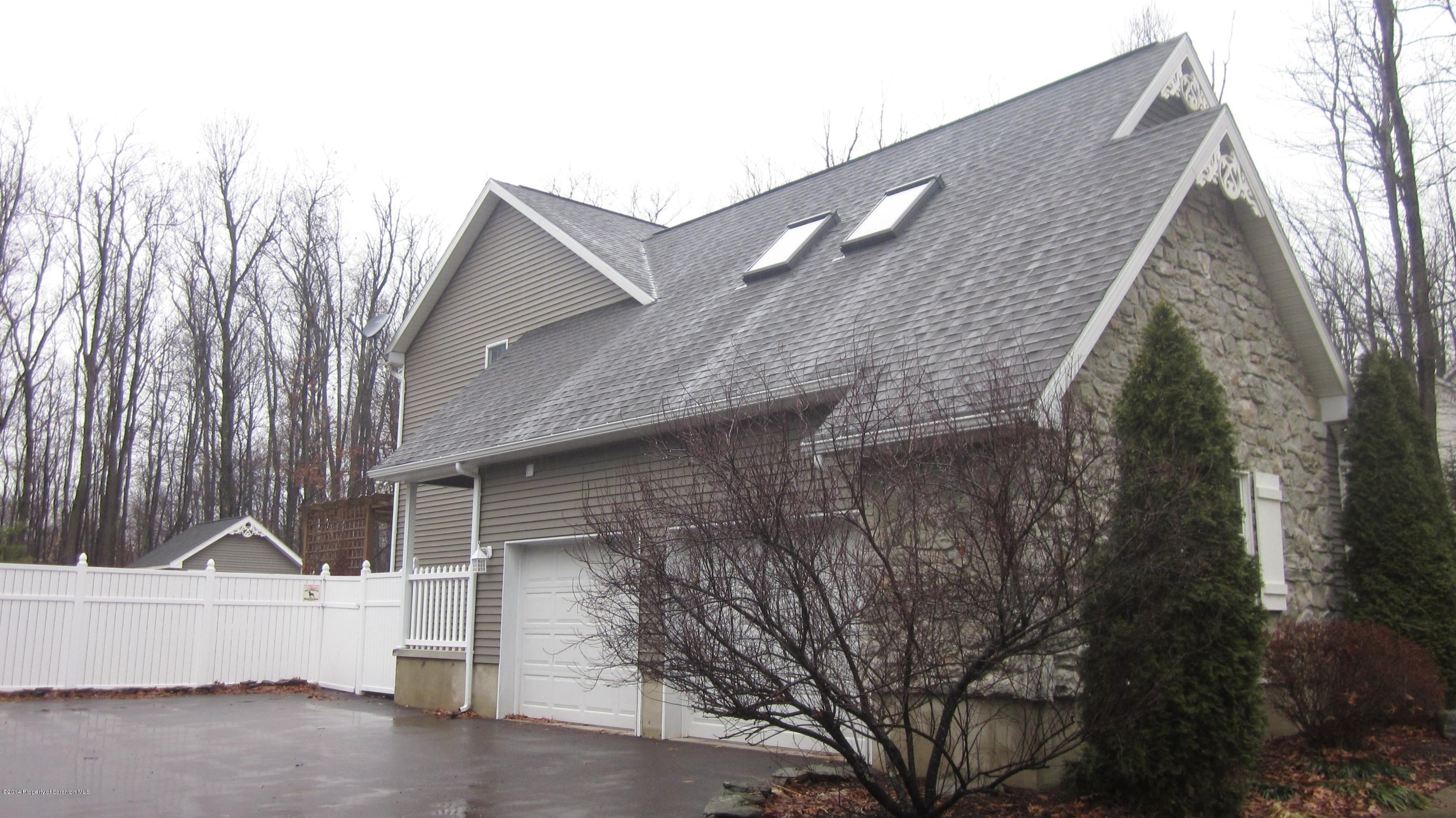 329 Golf Club Road Moscow, PA 18444 - Photo 55 of 56 a view of a house with a yard
