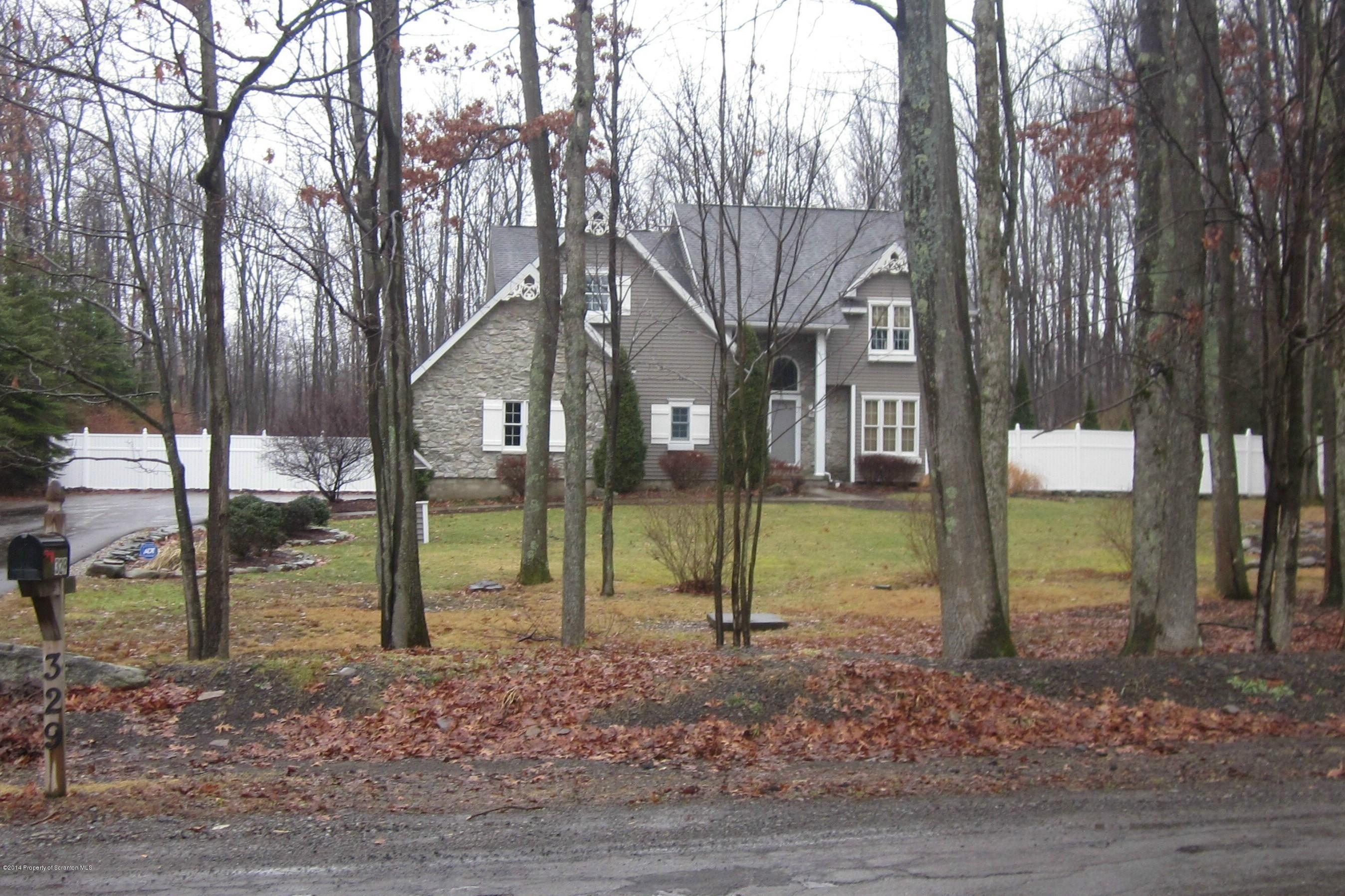 329 Golf Club Road Moscow, PA 18444 - Photo 56 of 56 a view of a house and a backyard