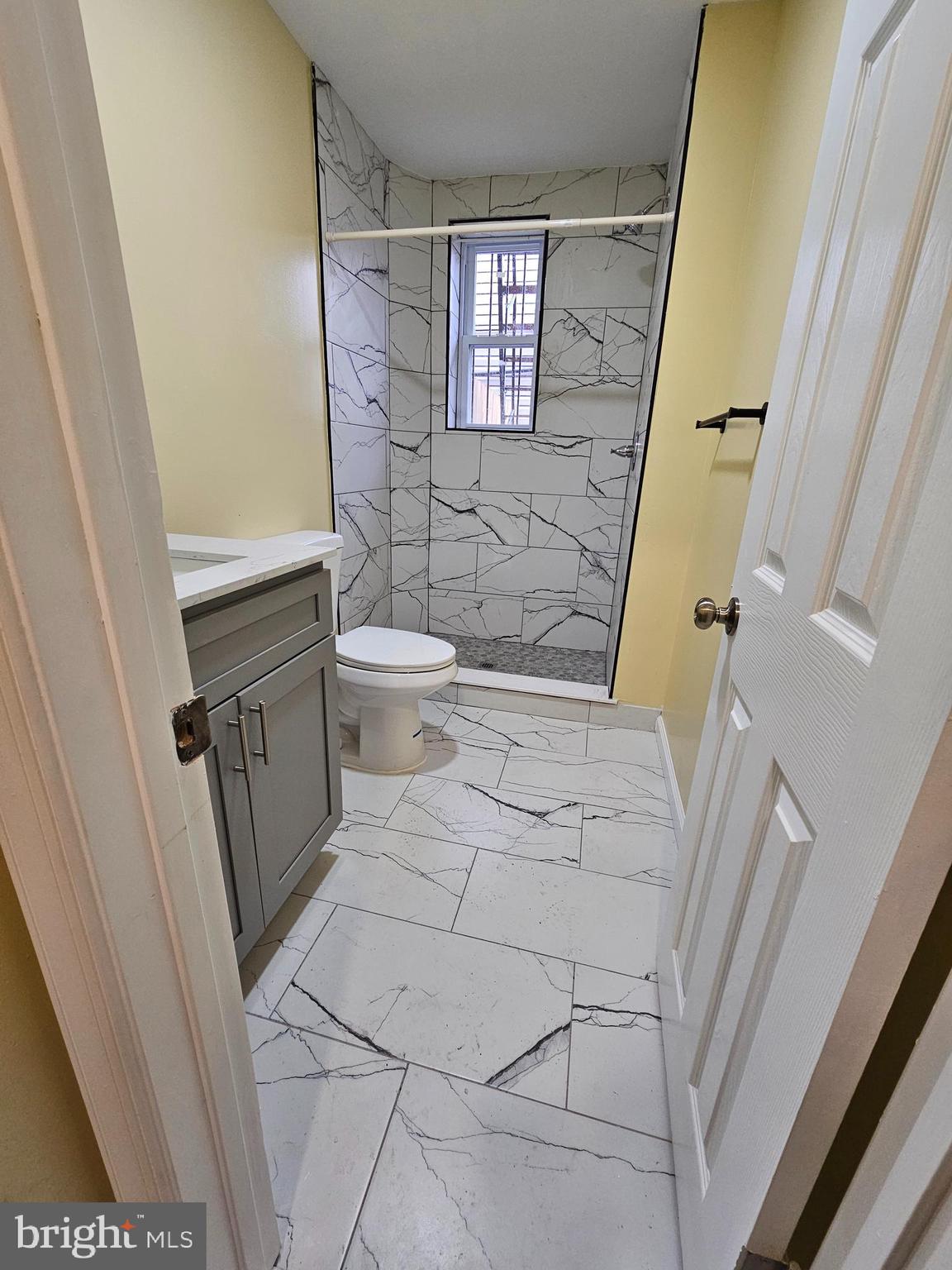 1535 North 60th Street, Unit A Philadelphia, PA 19151 - Photo 5 of 11 a bathroom with a toilet and a shower