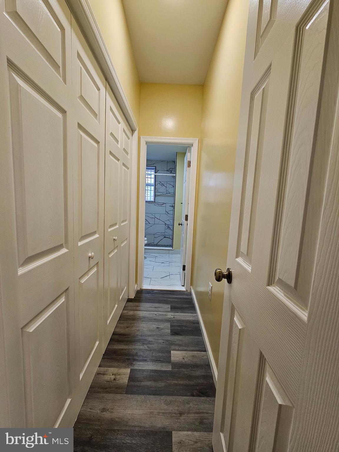 1535 North 60th Street, Unit A Philadelphia, PA 19151 - Photo 10 of 11 a view of a hallway with wooden floor and staircase