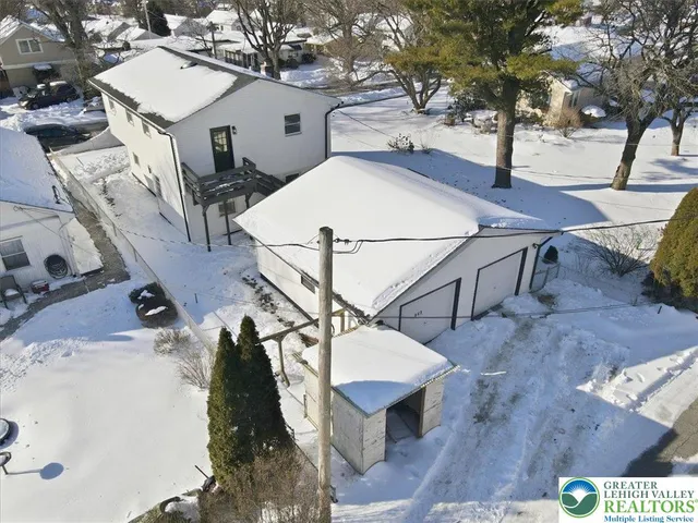 a view of a house with a park