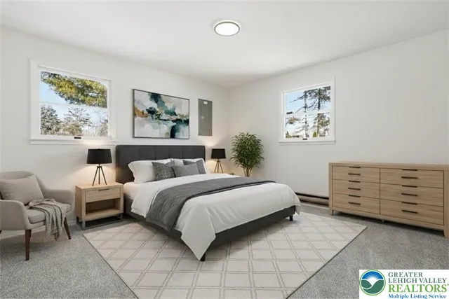 a spacious bedroom with a bed and a window