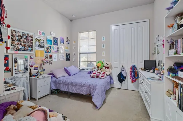 a bed room with a bed and a couch