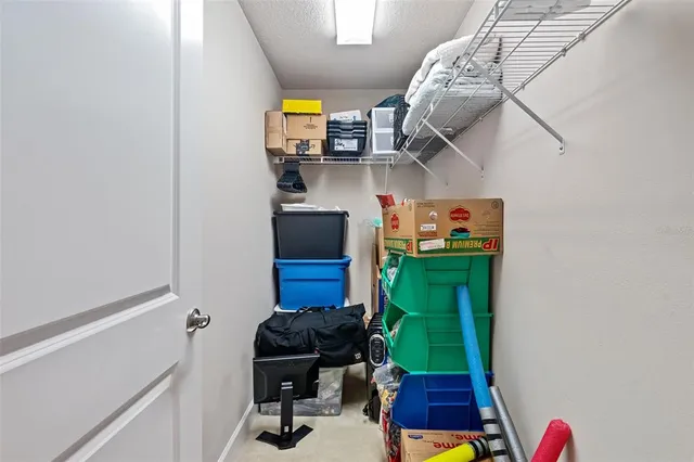 a workspace with furniture and a gate