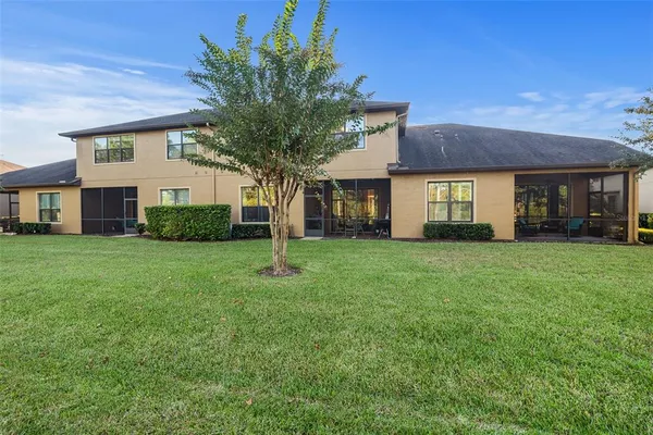 a view of a house with a big yard