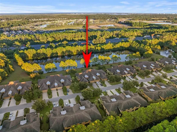 an aerial view of residential house with outdoor space
