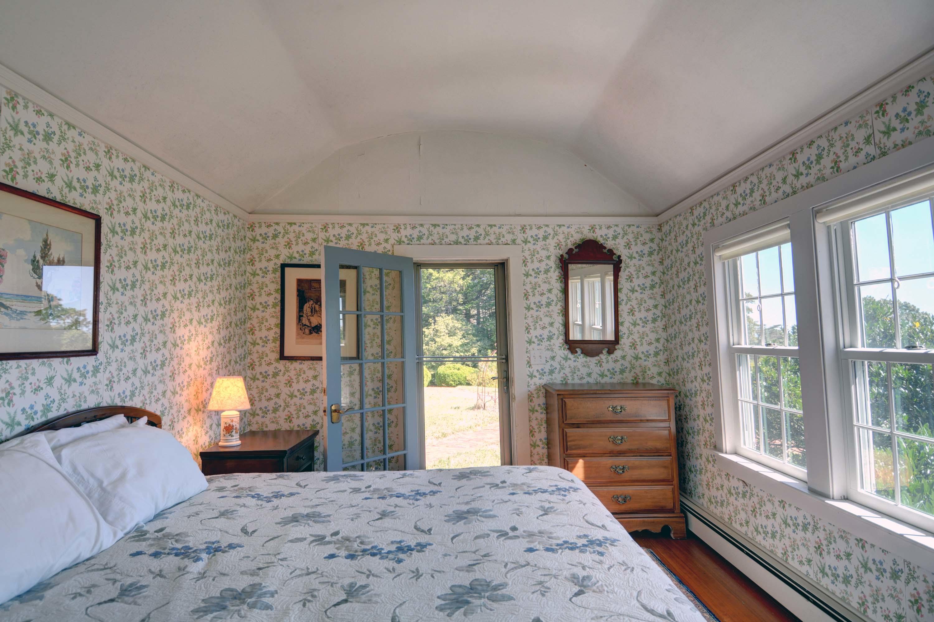 17 High Mark Road Chilmark, MA 02535 - Photo 24 of 52 a bedroom with a bed wooden floor and window