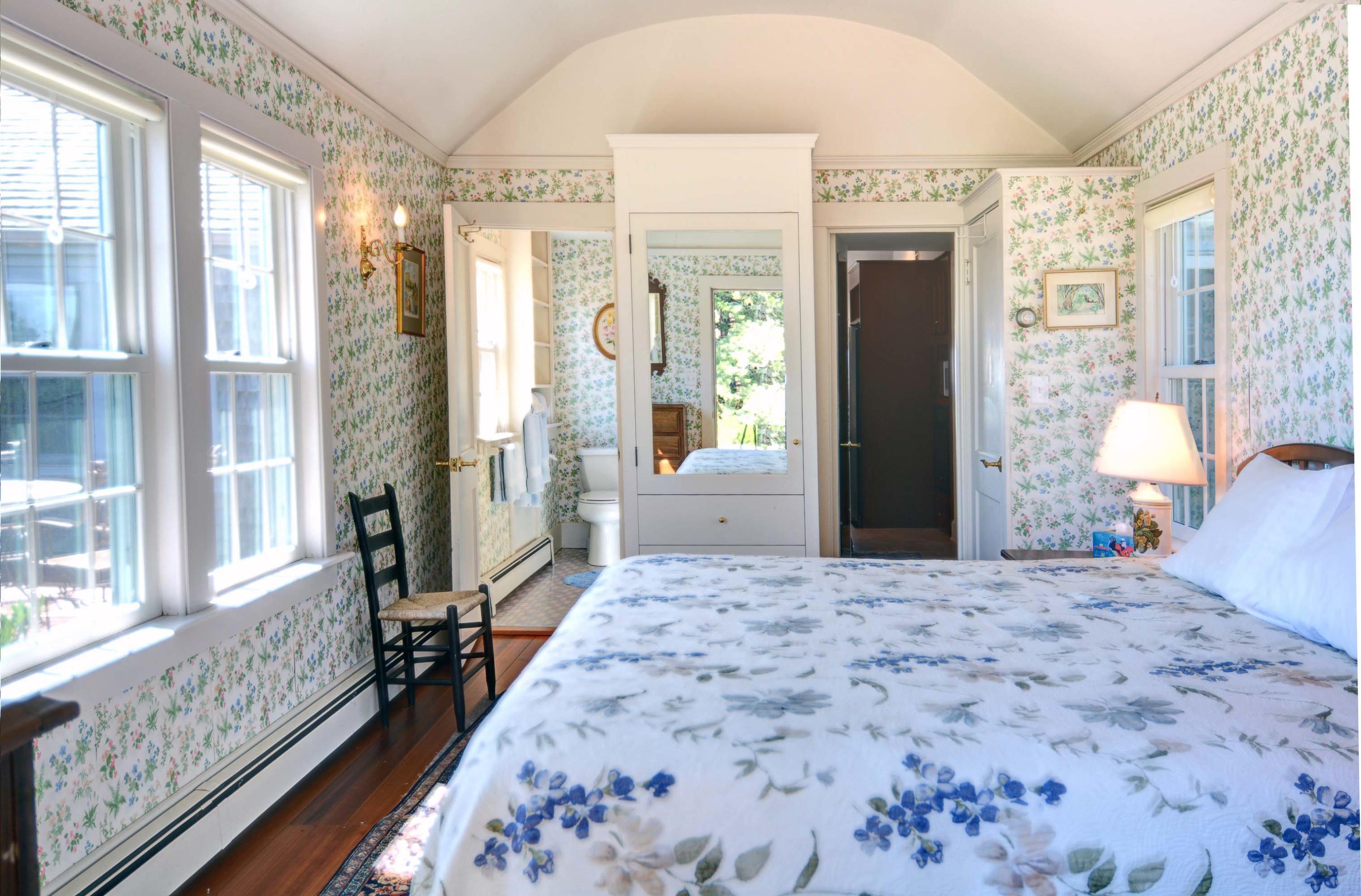 17 High Mark Road Chilmark, MA 02535 - Photo 25 of 52 a large bedroom with a large bed and glass windows