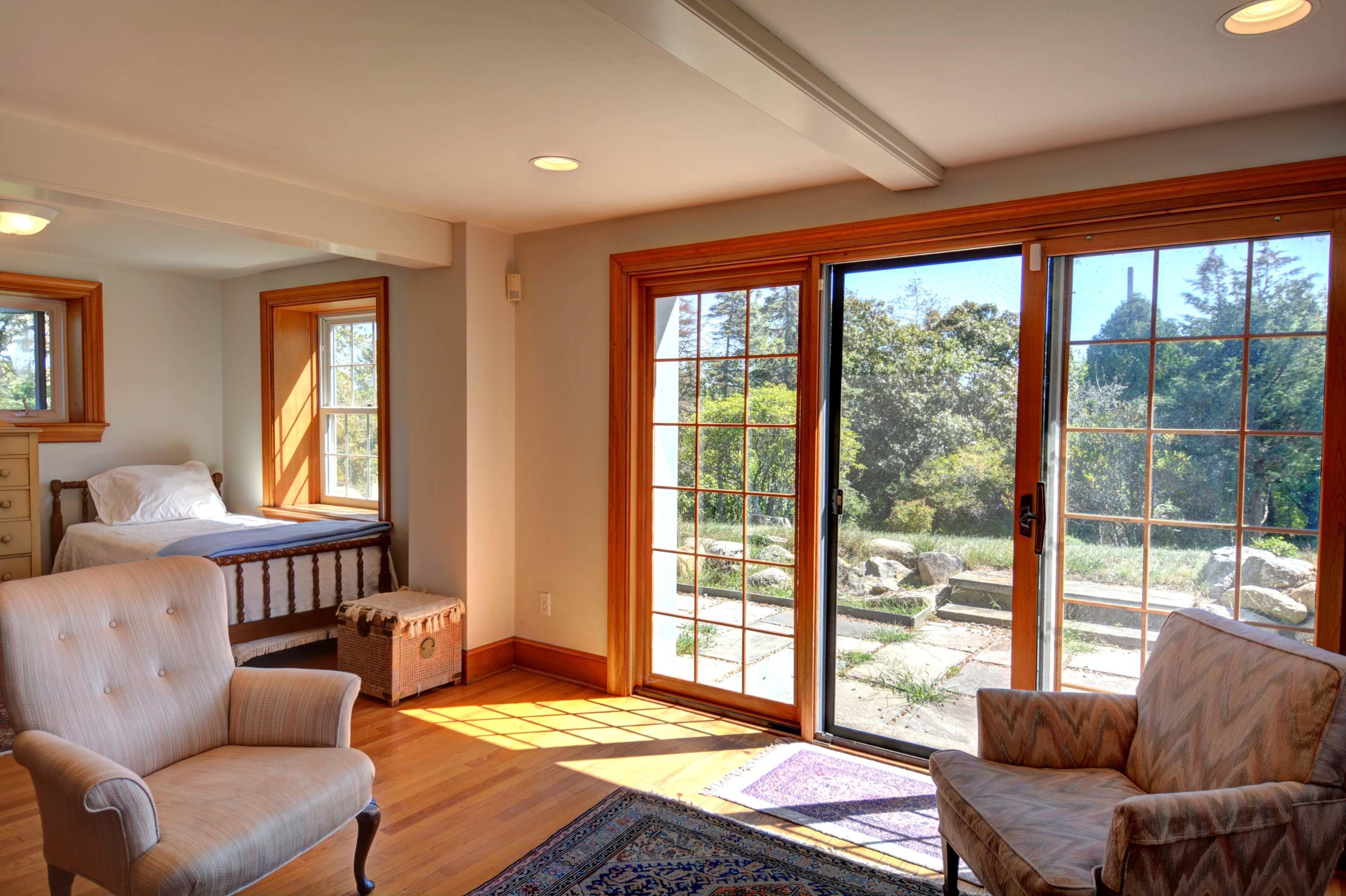 17 High Mark Road Chilmark, MA 02535 - Photo 28 of 52 a bedroom with furniture and large windows