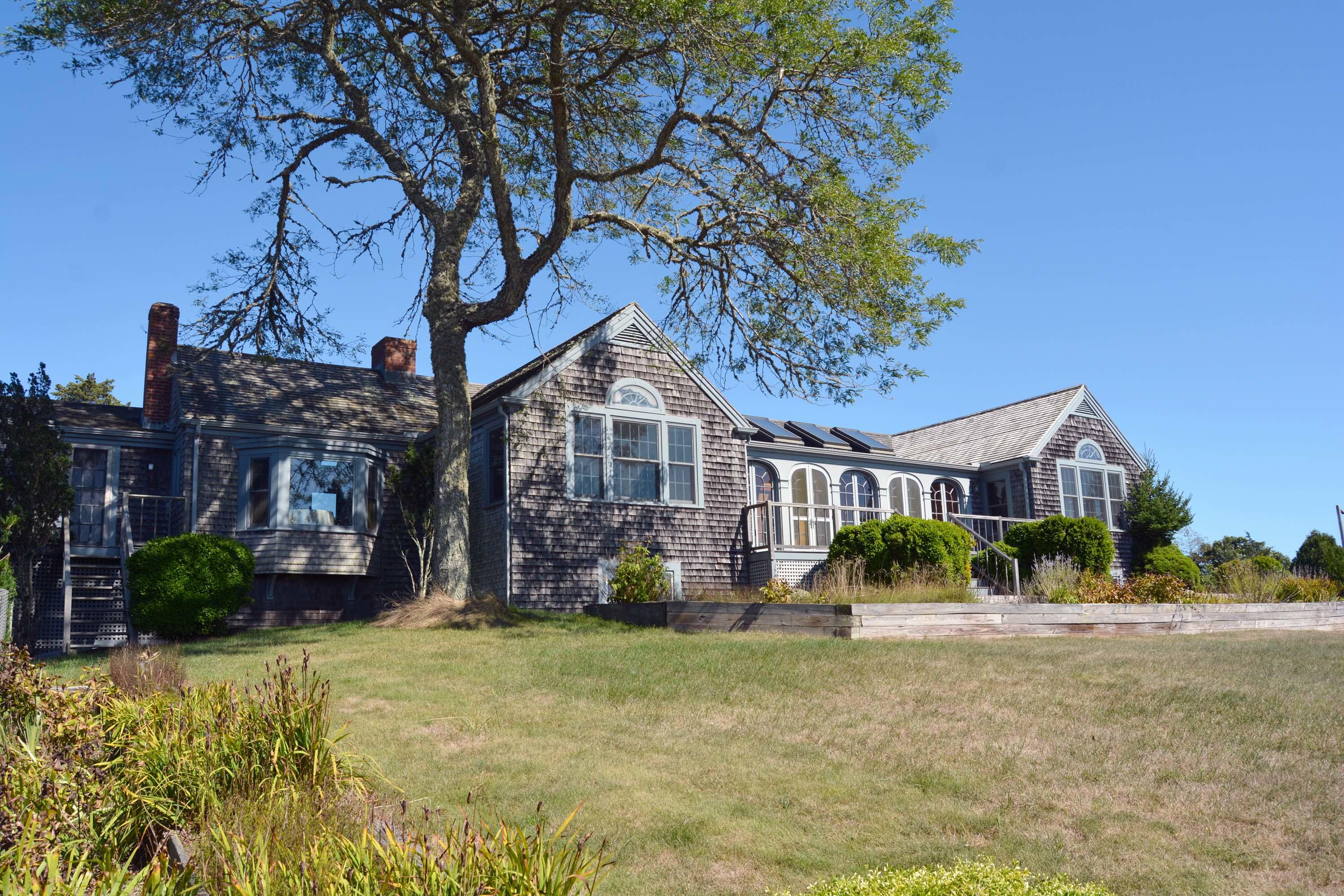 17 High Mark Road Chilmark, MA 02535 - Photo 30 of 52 a view of a house with a yard