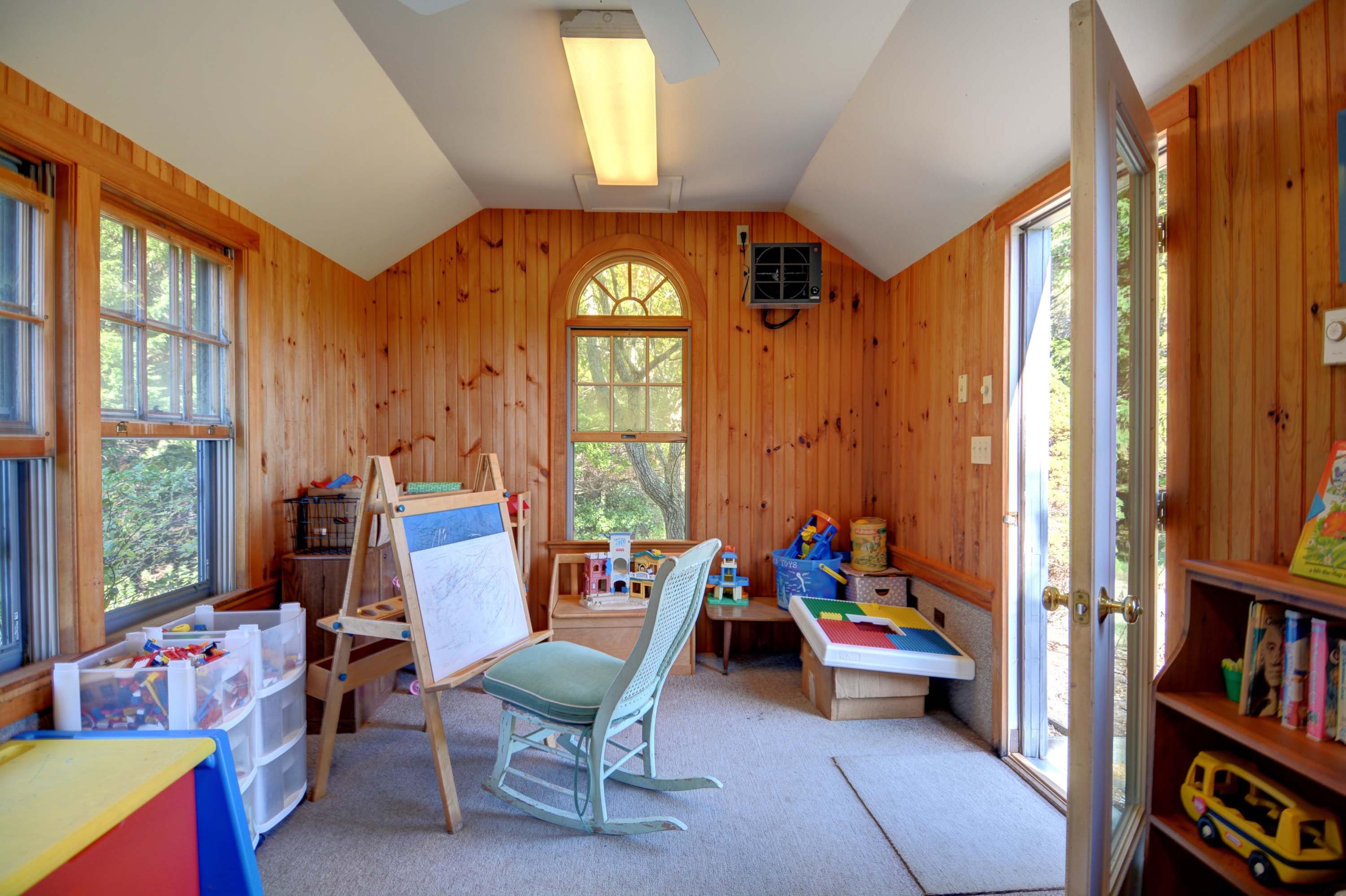 17 High Mark Road Chilmark, MA 02535 - Photo 44 of 52 a living room with furniture and a large window
