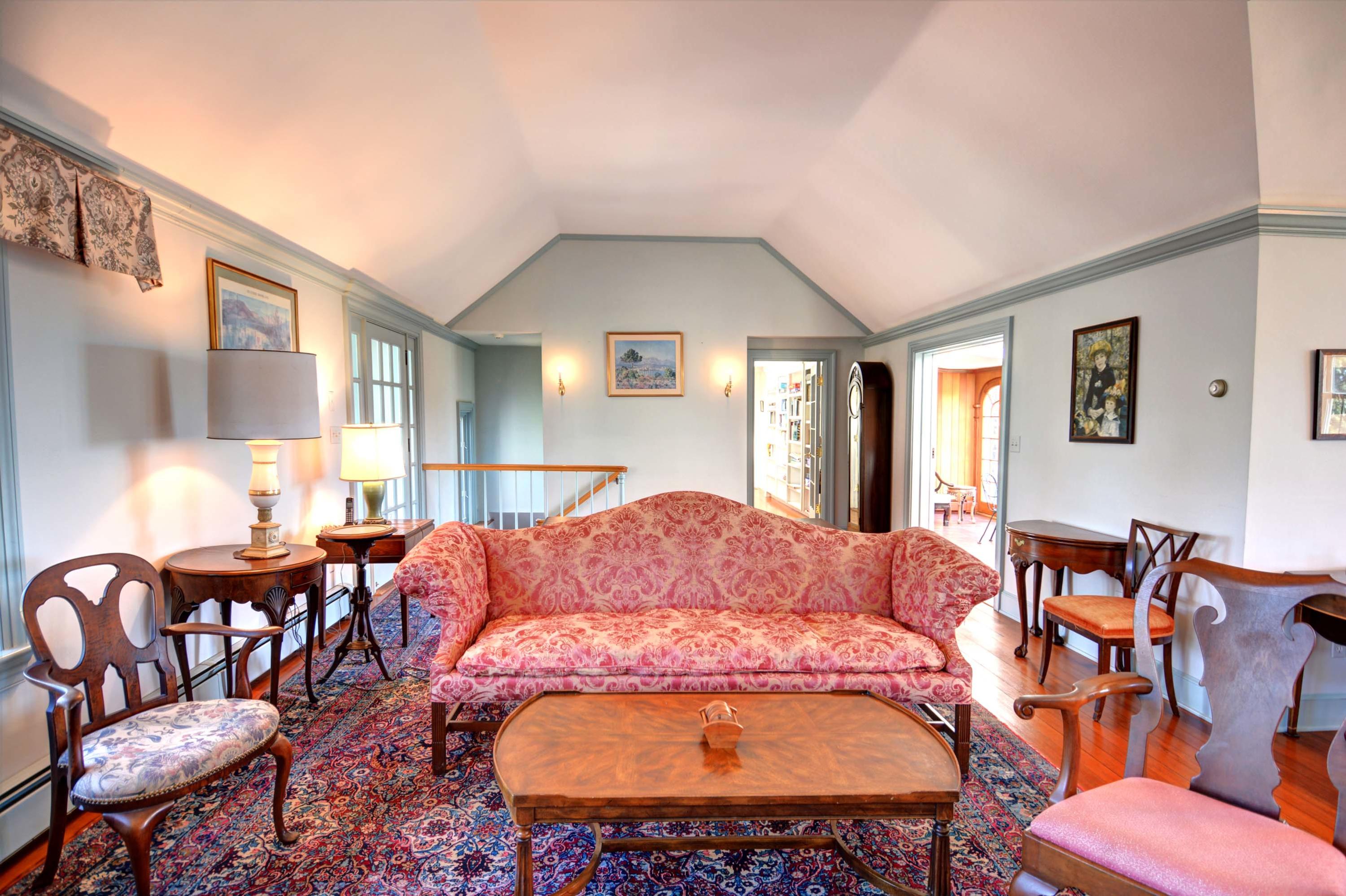 17 High Mark Road Chilmark, MA 02535 - Photo 6 of 52 a bedroom with a bed and wooden floor