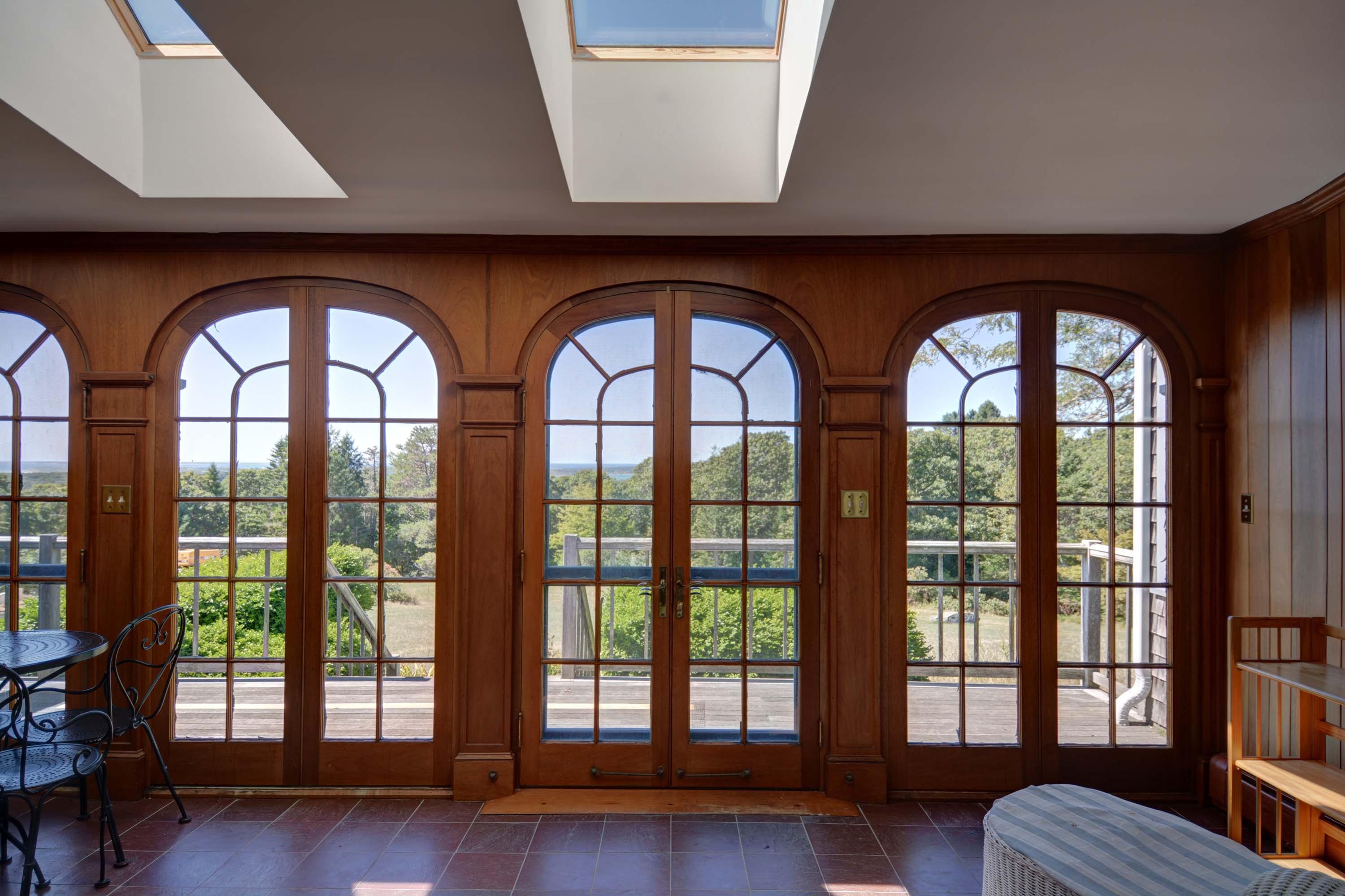 17 High Mark Road Chilmark, MA 02535 - Photo 9 of 52 a view of room with balcony and large windows
