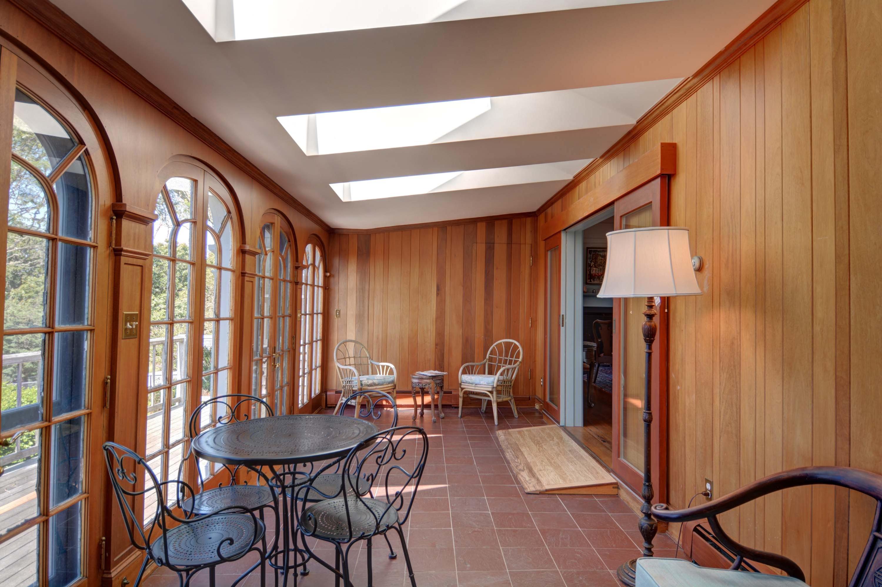 17 High Mark Road Chilmark, MA 02535 - Photo 10 of 52 a view of a dining room with furniture window and outside view