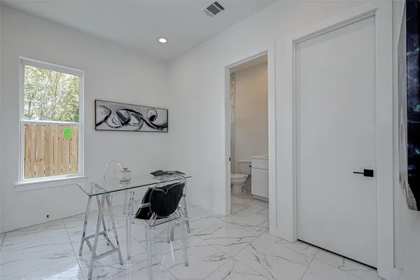 a view of a room that has a window in it
