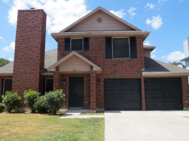 821 Dimrock Schertz, TX 78154 - Photo 1 of 1 a front view of a house with a yard