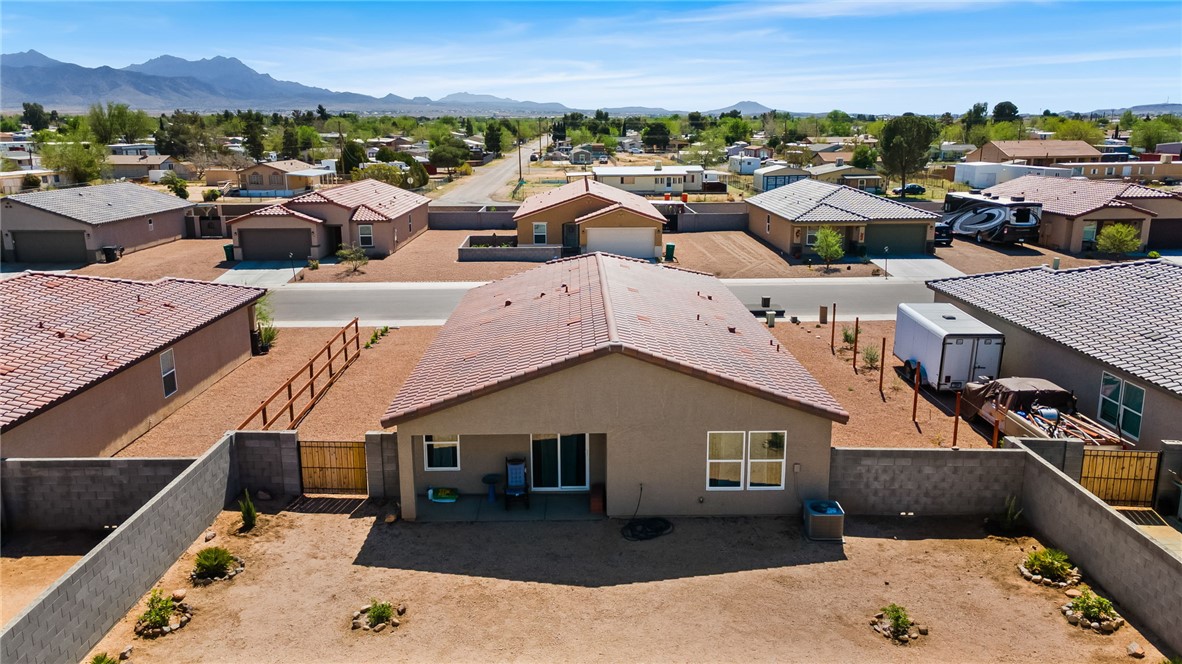 3623 East Andrea Drive Kingman, AZ 86409 - Photo 31 of 40 The property features an exterior with a tile roof and stucco siding, providing a modern aesthetic