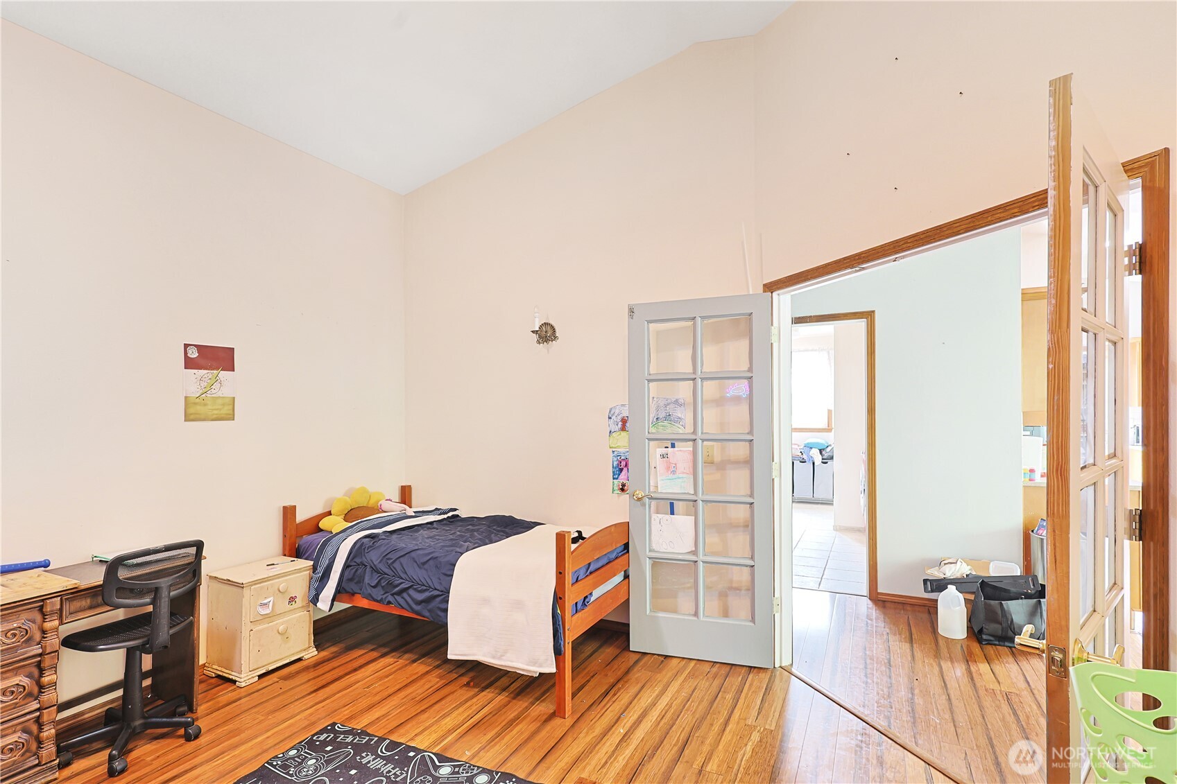 447 Boistfort Road Curtis, WA 98538 - Photo 21 of 40 a bedroom with a bed and wooden floor