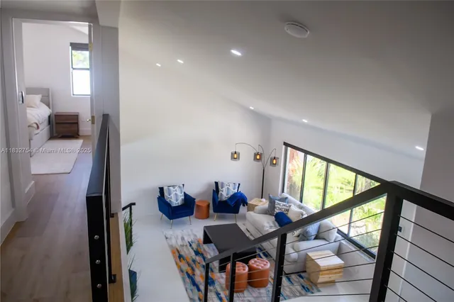 a bathroom with a tub sink and a mirror